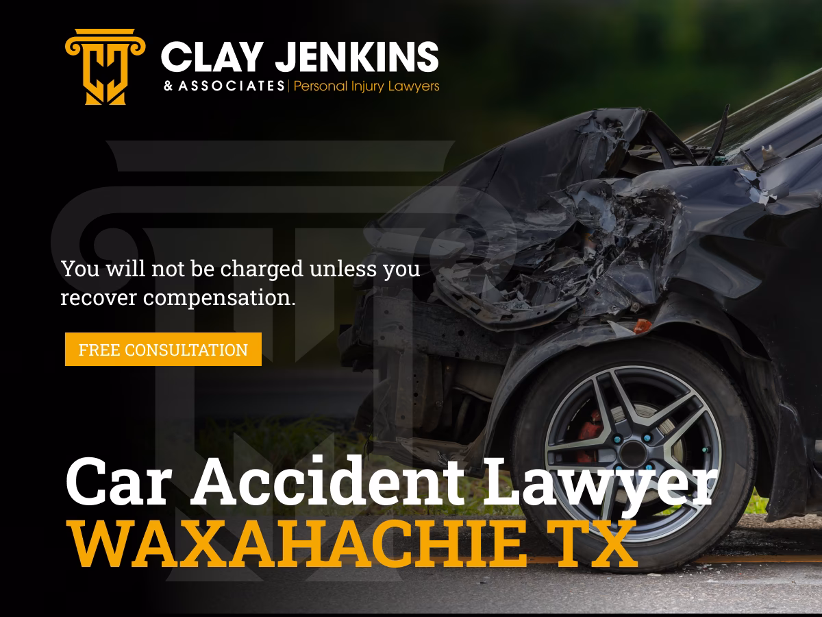 Damaged vehicle from car accident with Clay Jenkins & Associates logo and Waxahachie car accident lawyer branding