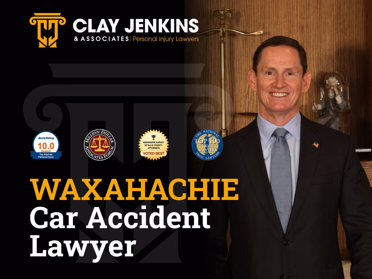 Male attorney in formal business attire standing in law office with professional badges including Avvo 10.0 rating and Top 100 National Lawyers certif