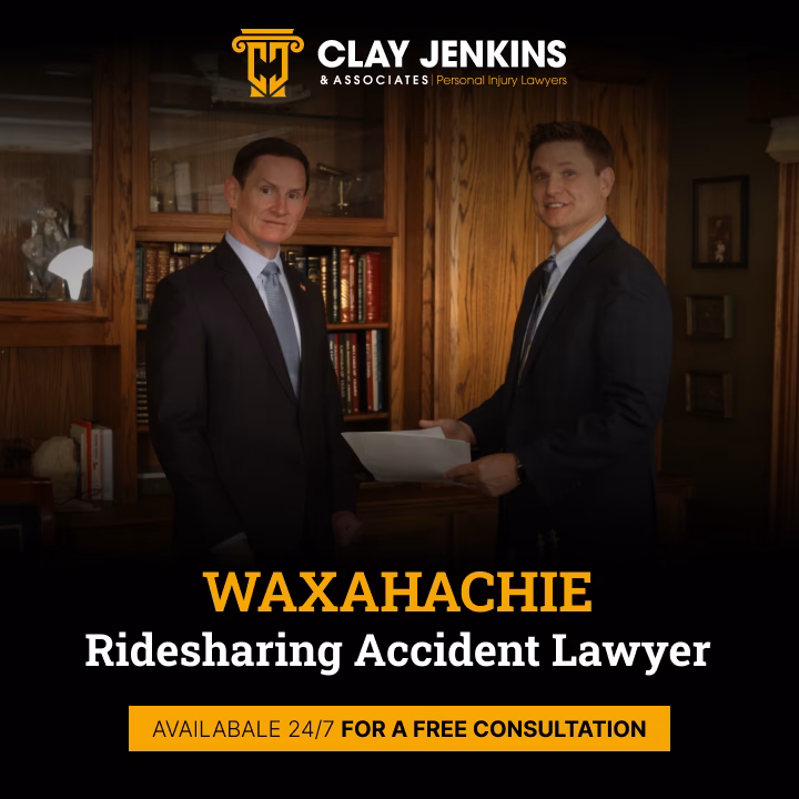 Two male attorneys in business suits in law office library with Clay Jenkins & Associates logo
